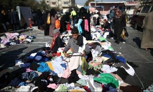 الاقتصاد بغزة توضح أسباب إدخال الملابس المستخدمة "البالة"