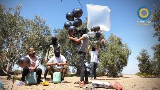 مسؤولون أمنيون: إطلاق البالونات من غزة لأجل الضغط لتسريع مشاريع مدنية